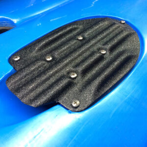 Check out this sleek, black Raymarine Ready Transducer Mount designed specifically for Hobie® kayaks. It’s not just about looks; this mount features a textured finish and comes complete with screws for a hassle-free installation. Expertly integrated onto a blue surface, it provides ultimate compatibility and ease of use for all your angling adventures!.