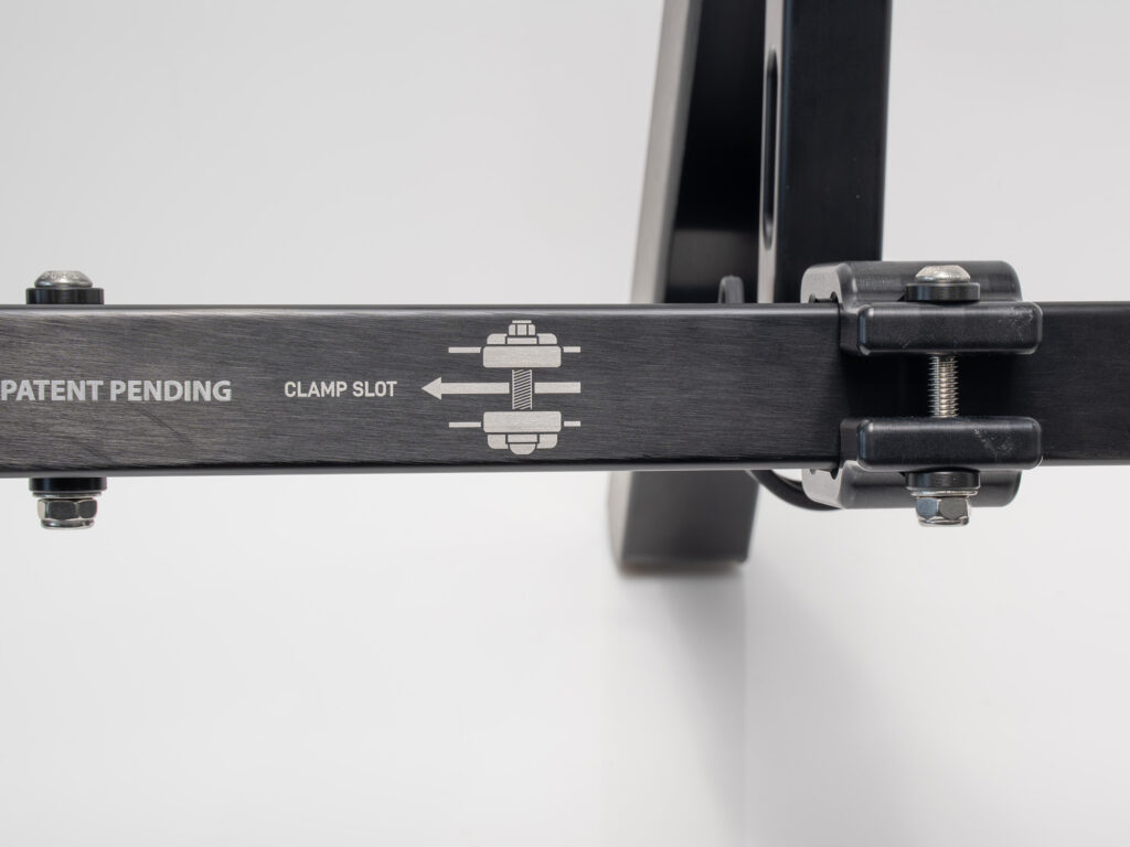 Align the Kimmi Cart kayak bunk arms on the axle housing using the fitting label as a guide