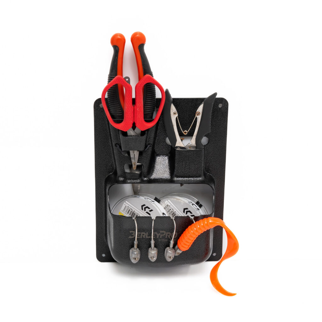 Check out the BerleyPro Stow Bro wall-mounted tool holder—the ultimate organizer for your gear! Featuring some snazzy red-handled pliers and scissors, plus a couple of must-have BerleyPro items. With an eye-catching orange curved accessory and one seriously versatile extra tool, this setup promises to keep your workspace tidy and efficient. Elevate your game with BerleyPro!.