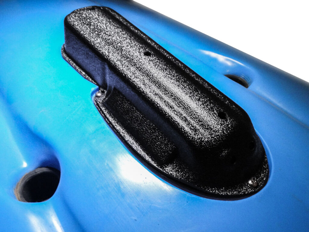 Check out this cool close-up of a blue kayak's mounting bracket, decked out with a sleek textured black cover. It's just the thing you need to securely attach your Humminbird Mega Imaging Ready Transducer Mount, specially designed to suit Hobie® kayaks. Perfect for those who want performance and style out on the water!.