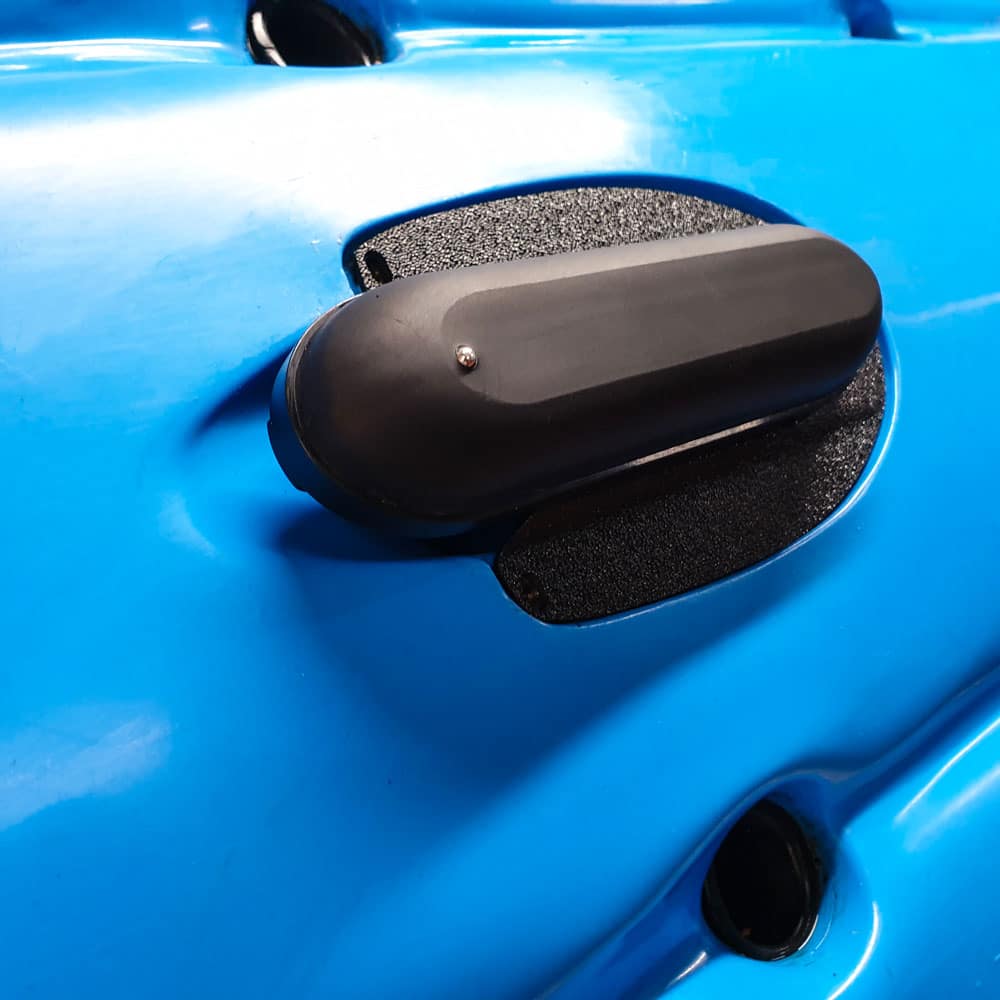 Get a load of this: a close-up shot of the Raymarine HV-100 Ready Transducer Mount, perfectly suited for your Hobie® kayak. It's snugly affixed to a bright blue kayak hull, ready to elevate your fishing game with precision and style.