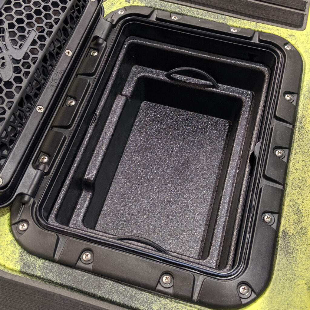 Introducing the Bucket Bro (Suits Hobie®) – your ultimate storage solution with that rugged BerleyPro flair! This open rectangular black storage hatch screams functionality with its textured compartments, perfectly designed to stash your gear in style. Framed in sleek black and accented by robust metal screws, the Bucket Bro is as tough as it looks, making it perfect for all your adventures on water or land.