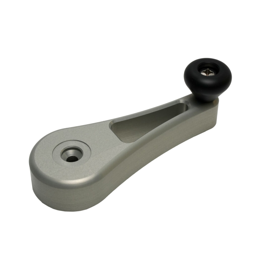 Introducing the Titan Grip - Aluminum Handle Upgrade, a true game-changer for your Hobie® Pro Angler. This sleek silver metal hand crank is designed with precision and style. With its robust black knob and recessed aluminum handle, this upgrade ensures optimal performance on the water. Engineered with a central hole for perfect balance, it's more than just an accessory; it's a must-have enhancement to elevate your kayaking experience to the ultimate level of control and durability.