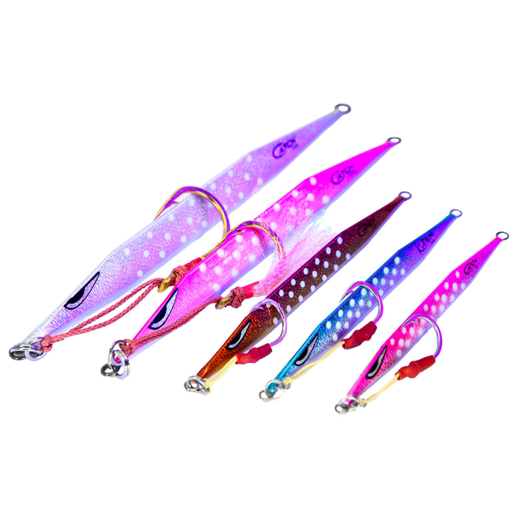 Check out the Catch Double Trouble Jig set from BerleyPro, boasting a lively lineup of six eye-catching jigs in different sizes, each with dazzling finishes and hook attachments. These beauties are displayed against a crisp white backdrop that really makes their sparkle pop!.
