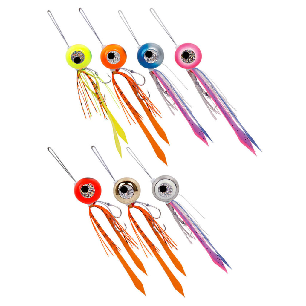 On display, we've got the Catch Freestyle Kabura Jig lures all lined up and looking sharp in two neat rows. These bad boys come equipped with sleek silver hooks and sport an array of lively tassels flaunting vibrant colors like orange, pink, and yellow—all set against a crisp white backdrop. Whether you're gearing up for your next fishing adventure or just admire top-notch tackle gear, these jigs are bound to catch your eye!.