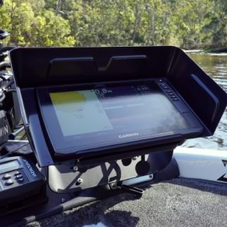 Picture this: You’re cruising down the river with your Garmin Visors marine GPS proudly mounted on your boat, giving you an unparalleled view of both the winding waterways and the lush backdrop of towering trees.