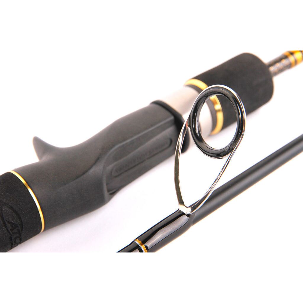 Get up close and personal with the sleek black Catch Kensai Pro Series Slow Pitch Jigging Rod handle. With its sharp line guide in focus and eye-catching metallic accents, it’s crafted perfectly for mastering those slow pitch techniques.