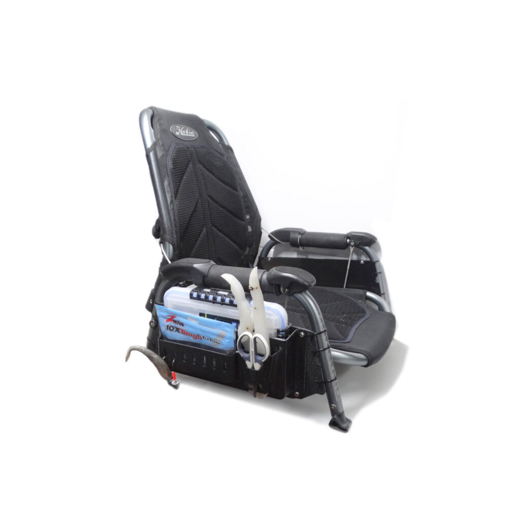Check out the awesome Prison Pocket with Vantage Chair Adaptor! This bad boy boasts a sleek black and gray design perfect for any outdoor adventure. It comes complete with an easy folding mechanism and a super handy attached container on the side to keep your gear right where you need it. Perfect combination of style and convenience!.
