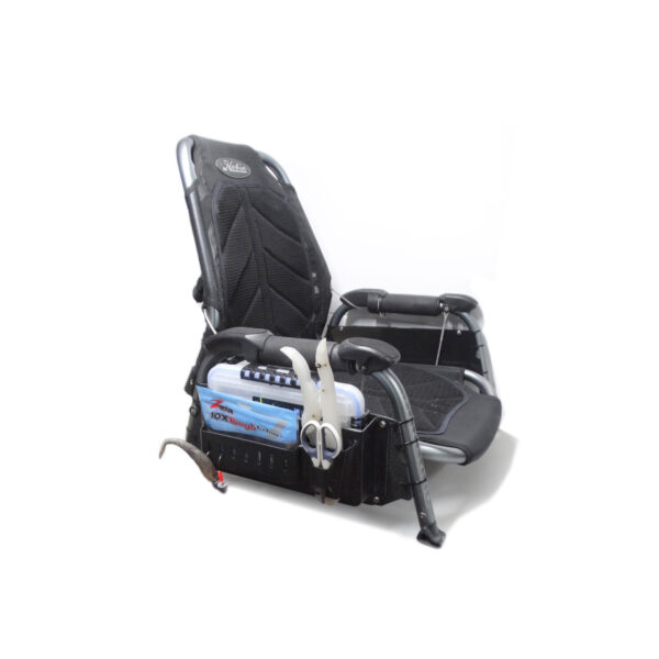 Check out the awesome Prison Pocket with Vantage Chair Adaptor! This bad boy boasts a sleek black and gray design perfect for any outdoor adventure. It comes complete with an easy folding mechanism and a super handy attached container on the side to keep your gear right where you need it. Perfect combination of style and convenience!.