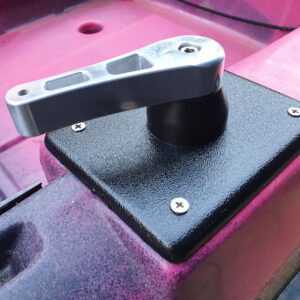 Check out the slick upgrade for your Native Watercraft Slayer 10/13/Manta! This aluminum handle is not just any handle—it's designed with a precise lever extension that sprouts from a sturdy black square base, all against a striking pink surface. And yes, those visible screws add an industrial touch that's as stylish as it is functional.
