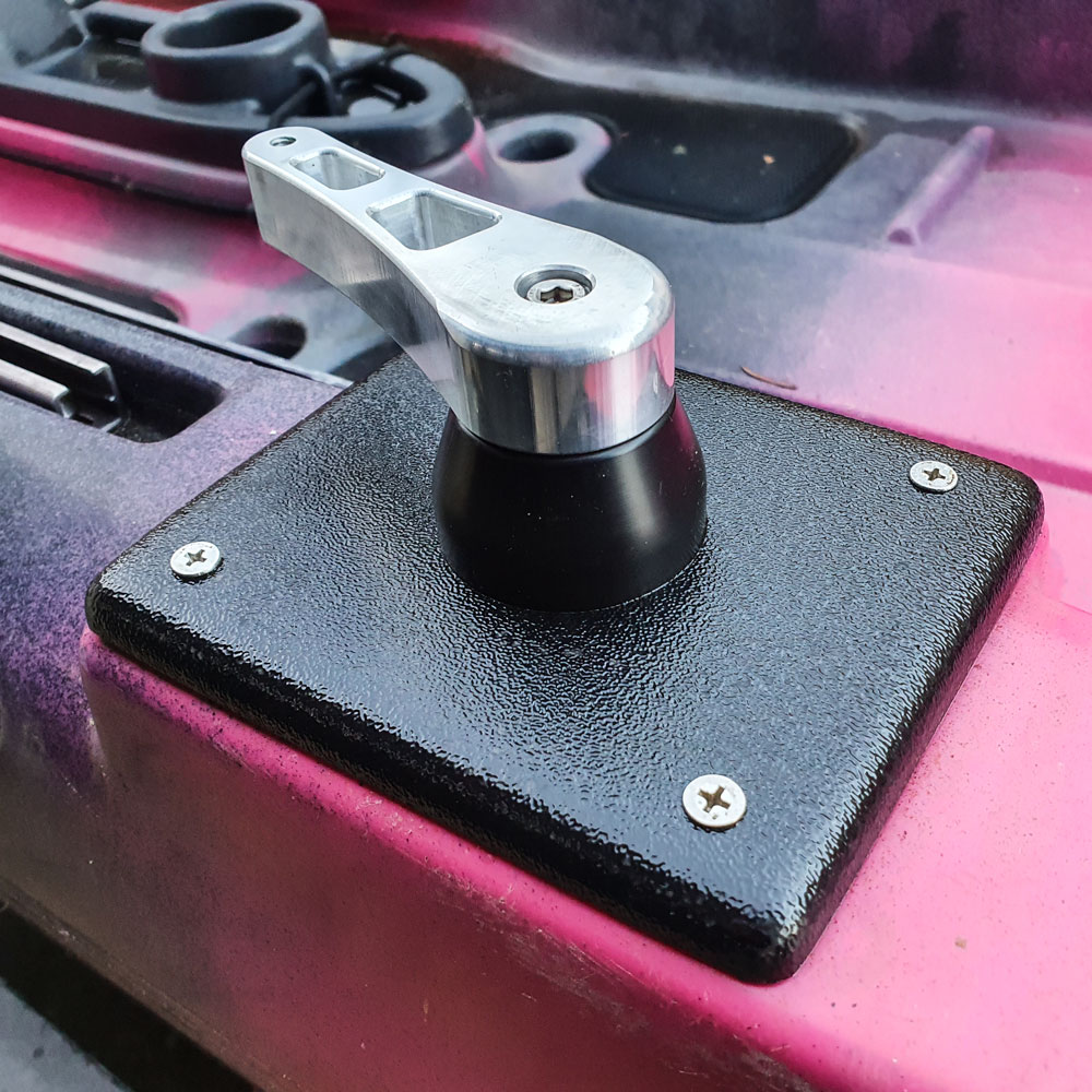 Introducing the rock-solid Native Watercraft Slayer 10/13/Manta Upgraded Aluminium Handle and Bush! This bad boy boasts a sleek metallic swivel mount set atop a rugged textured black rectangular base. With four sturdy screws keeping it all secure, it's as solid as they come. The bold contrast of its pink and black surface not only demands attention but elevates your ride to the next level of style and functionality. Get ready to make some waves!.