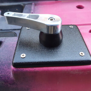 Check out this beauty! Feast your eyes on the Native Watercraft Slayer 10/13/Manta Upgraded Aluminum Handle. It's bolted down with four sleek screws onto a black plate, making that vibrant pink backdrop pop even more. This is style and functionality in perfect harmony, just like we love at BerleyPro!.