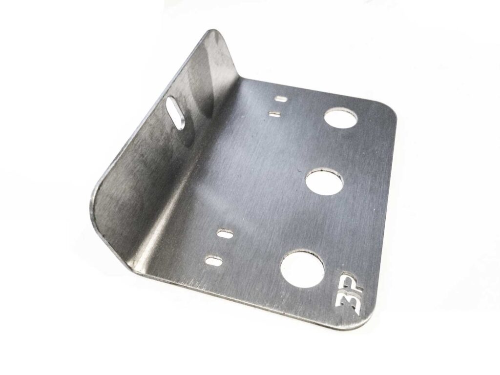Introducing the BerleyPro Switch Mount—where functionality meets finesse! Crafted with a rugged metal mounting bracket, this bad boy is decked out with an array of screw holes, all bent to the precise 90-degree angle you need. It's your go-to solution for a switch mount that's as reliable as it is sleek. Set against a clean white backdrop, its elegance truly shines through. Perfectly engineered to handle any setup you throw its way!.