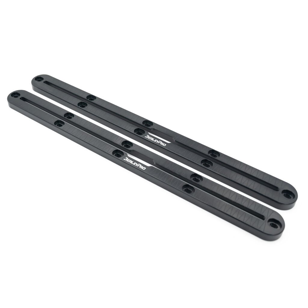 Introducing our BikeYoke Brackets, your new best buddy for supreme stability and versatility! These parallel black metal titans come armed with a plethora of precise holes and grooves, ready to tackle any challenge. Picture them lying confidently on a crisp white backdrop like they've just rolled fresh off the production line of Titan Tracks To Suit Old Town – because that's the level of solid engineering we're talking about here. Perfect companions for those adventures where nothing less than perfection will do!.