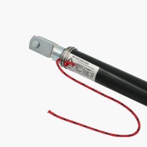 Say hello to the Will-I-Loader Gas Assist Strut, where functionality meets flair! This sleek, black hydraulic cylinder is designed with precision and features sturdy metal attachments that highlight its high-quality craftsmanship. The standout feature? A vibrant red rope casually tied around one end, adding a touch of character and contrast to its rugged look. Perfectly engineered for performance while catching the eye with its unique style!.