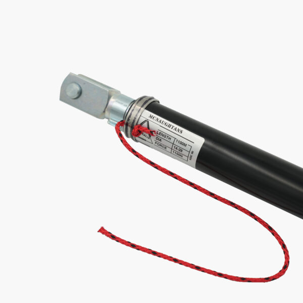 Say hello to the Will-I-Loader Gas Assist Strut, where functionality meets flair! This sleek, black hydraulic cylinder is designed with precision and features sturdy metal attachments that highlight its high-quality craftsmanship. The standout feature? A vibrant red rope casually tied around one end, adding a touch of character and contrast to its rugged look. Perfectly engineered for performance while catching the eye with its unique style!.