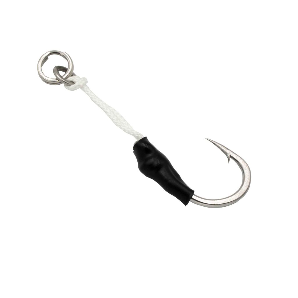 Check out the Micro Jigging Assist Hooks, crafted for performance and ease! These bad boys come with a slick silver fishing hook connected to a sturdy white braided leader. Featuring a sleek black wrap and topped off with a durable metal loop, they're designed for effortless attachment. Perfect for stepping up your fishing game!.