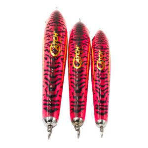 Check out this lineup of three striking red and black fishing lures, including the legendary Catch Handmade Stickbait Mojo F Series. Arranged perfectly in size order, each lure proudly sports vibrant yellow text and gleaming metallic hooks that are sure to reel in even the most discerning fish. Get ready to elevate your fishing game with these irresistible temptations!.