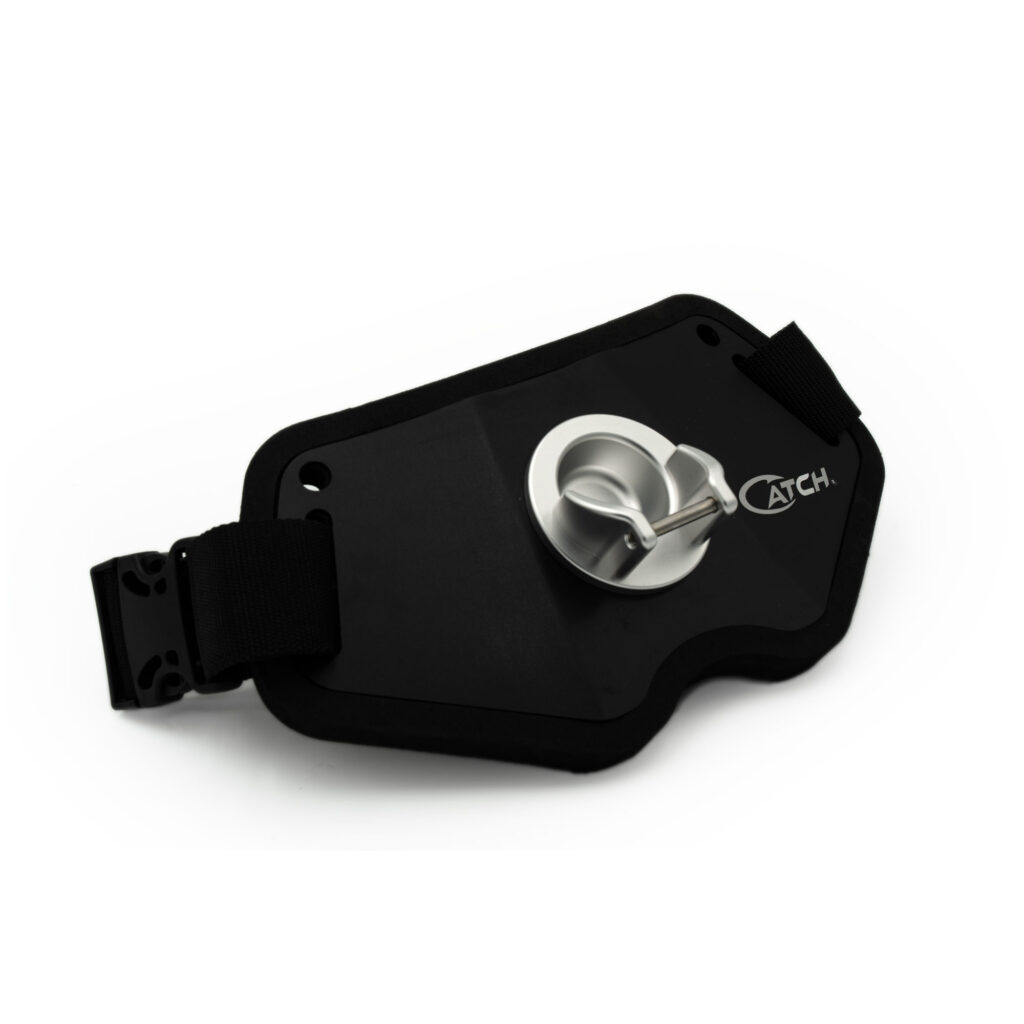 Introducing the Catch Heavy Duty Gimbal Fight Belt, where rugged design meets uncompromised performance. Decked out with a sleek black and silver finish, it boasts an eye-catching circular metal ring and adjustable straps to fit your precise needs. The engraved logo adds that touch of class while ensuring your gear stays locked in, offering unparalleled support during those epic fishing showdowns. Get ready to conquer the waters with confidence!.