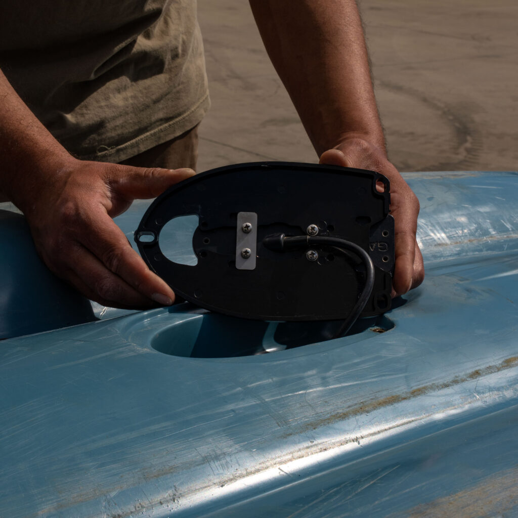 A Garmin Transducer Mounted to a BerleyPro Transducer Mount Ready To Be Installed On A Kayak