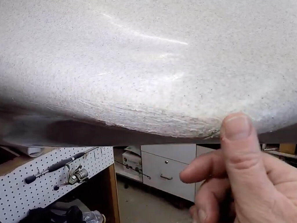 Scratched, gouged kayak hull before fitting Bumper Bro